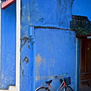 Blue wall and Bicycle Hoi An Vietnam