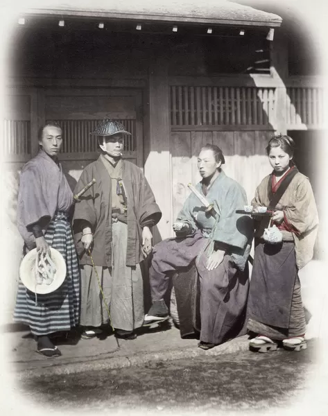 1860s Japan portrait of a samurai group being served by a