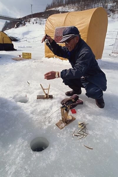 Ice fishing, Minami Furano Lake, Hokkaido, Japan, Asia