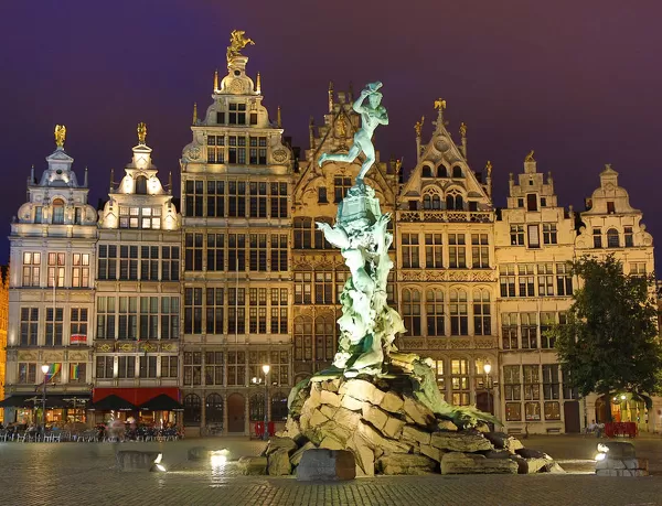 The Brabo Fountain in the Grote Markt at night in Antwerp, Belgium