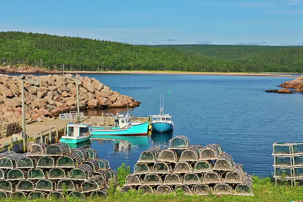 Fishing boats in coastal village. Cabot Trail. Cape Breton Island. Neils Harbour, Nova Scotia, Canada