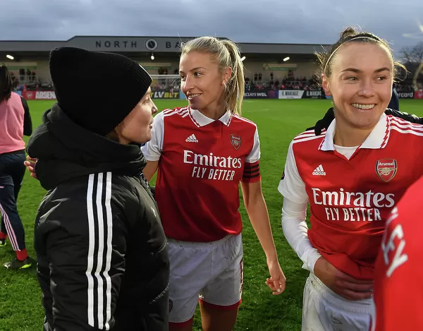 Arsenal Women Celebrate FA WSL Victory: Leah Williamson, Kim Little, and Caitlin Foord Rejoice