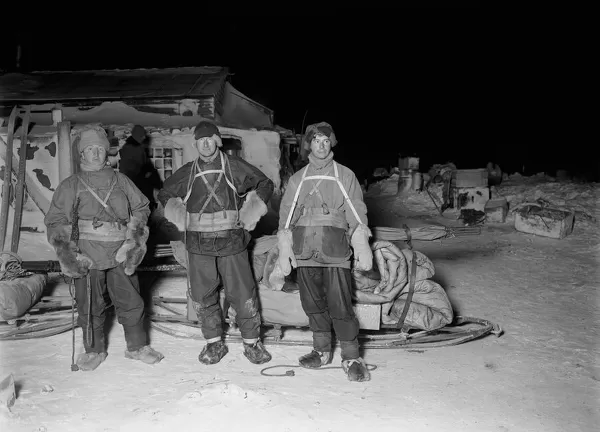 Lt Henry Bowers, Dr Edward Wilson and Apsley Cherry-Garrard beside their sledge