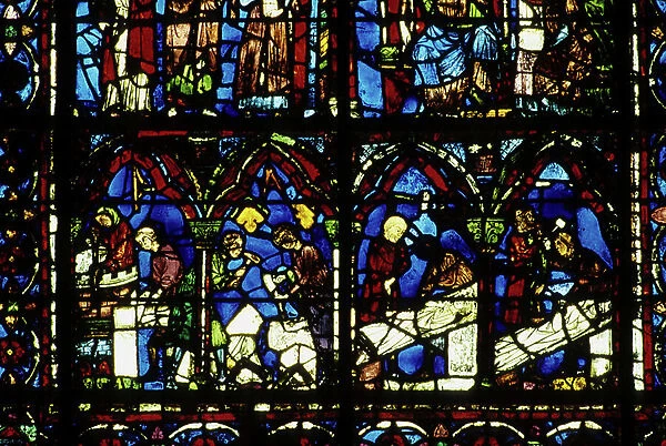 Gothic architecture. Stained glass representing imagery and stone cutters. These stained glass windows tell the story of Saint Cheron. 1225. Cathedrale de Chartres, ambulatory, north coast