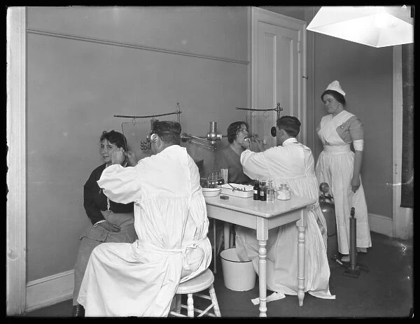 Two patients being examined, Examining room #1, Seton Hospital, Spuyten Duyvil, Bronx