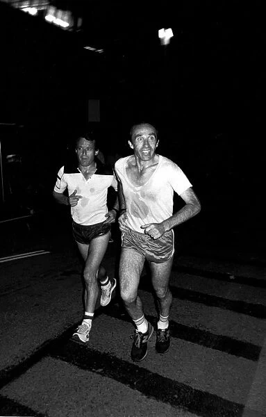 Prints of Frank Williams and Jackie Oliver jogging before FRANK WILLIAMS HISTORY