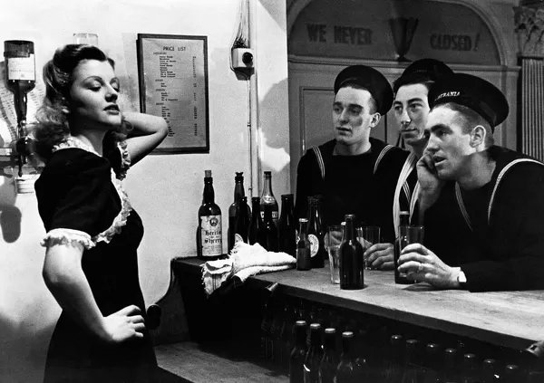 ABWW2 34 Sailors at the bar of a pub looking at barmaid