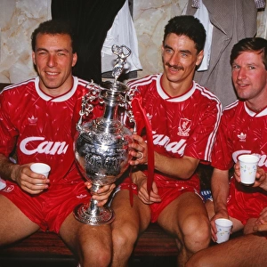 Liverpools Ronnie Rosenthal, Ian Rush, Ronnie Whelan and Alan Hansen celebrate winning the league title in 1990