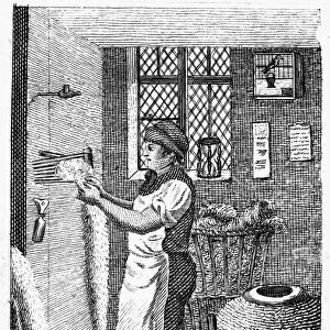 COLONIAL WOOL COMBER. A colonial American wool comber. Line engraving, late 18th century