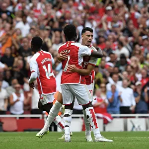 Arsenal Celebrate First Goal: Martinelli and Saka vs. Nottingham Forest (2023-24)