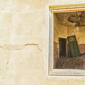 Sand In The Rooms Of A Colourful And Abandoned House; Kolmanskop, Namibia