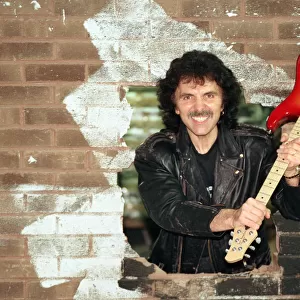 Black Sabbaths Tony Iommi helps to demolish a wall at Musical Exchanges in