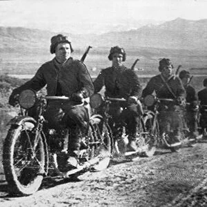 A motorcycle column of the Soviet Red Army on the march on the Southern Russia front as
