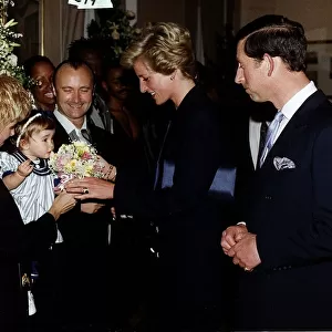 Singer and msusician Phil Collins with his family meeting Prince Charles