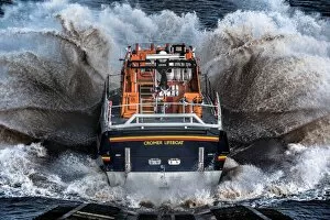 Fine art Pillow Collection: Cromer Tamar class lifeboat Lester 16-07 launching down the slipway, lots of white spray