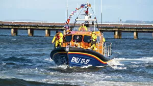 Grouper Pillow Collection: Invergordon Lifeboat RNLI 13-37 arriving at her new permanent home