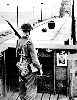 Nijmegen Collection: British Sentry keeping watch on Nijmegen Bridge; Second Worl