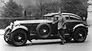 Woolf Collection: Captain Woolf Barnato with his Bentley