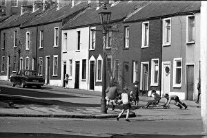 Swing Collection: Children playing in Milton Street, Belfast, Northern Ireland