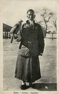 Falconry Collection: Chinese falconer with a Goshawk