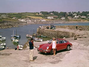 Mini Collection: Couple with red car at Coverack, Cornwall