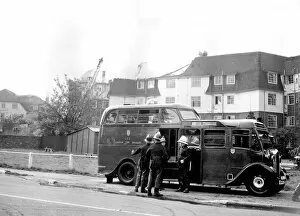 1954 Collection: Firefighters at the scene of a fire, Wildcroft Manor