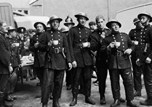 Firefighters Photographic Print Collection: Firefighters on a tea break after fire St Katherines Dock