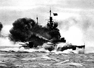 Royal Navy Photo Mug Collection: HMS Duke of York firing a broadside; Second World War