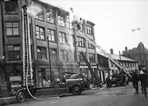 Woolf Collection: LFB turntable ladders in use at Hackney fire