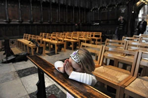 Carlisle Collection: A little girl kneels to say her prayers - Carlisle Cathedral