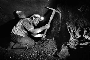 Photography by Philip Dunn Pillow Collection: Miner at coal face -3