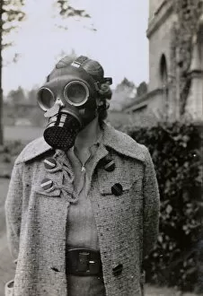 New Images from the Grenville Collins Collection Jigsaw Puzzle Collection: WW2 - Home Front - Woman in her Gas Mask
