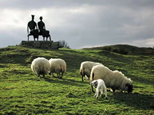 Sheep Poster Print Collection: Sheep - grazing before the Henry Moore sculpture King & Queen Glenkiln Estate Sculpture Park