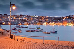 Country landscapes Poster Print Collection: St Ives - harbour and town from the pier at night - Cornwall