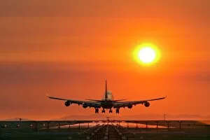 Plane Collection: Aeroplane landing at sunset