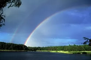 Rain Collection: Double rainbow over a lake