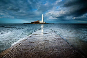 Light House Collection: England, Tyne and Wear, Whitley Bay. Incoming tide engulfs the causeway linking St Marys Island &