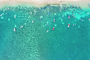 Mauritius Mouse Mat Collection: Aerial by drone of boats in the turquoise water of lagoon front of Mont Choisy beach