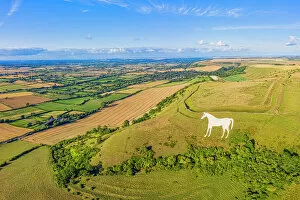 Salisbury Plain Collection: Aerial view of the famous White Horse below Bratton Camp