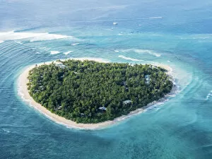 Atoll Collection: Aerial view of the heart-shaped island of Tavarua, near Viti Levu, Republic of Fiji