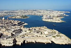 Malta Cushion Collection: Aerial view of Valletta and St. Elmo Fort, Manoel Island, and Dragutt Point on the right
