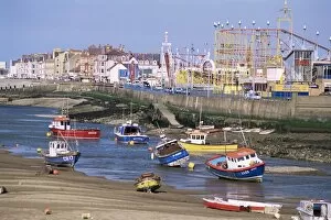 Rhyl Collection: Amusement park and boats in mouth of River Clwyd