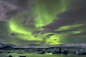 Aurora Borealis Collection: The Aurora Borealis (Northern Lights) captured in the night sky over Jokulsarlon glacial lagoon