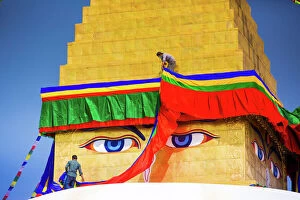 Tibetan Collection: Buddhist Monks decorating the temple at Bouddha (Boudhanath), UNESCO World Heritage Site