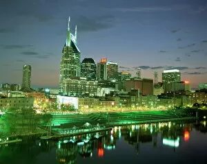Waterfront Collection: City skyline and Cumberland river at dusk