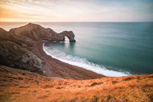 Natural Arch Collection: Durdle Door at sunrise, Lulworth Cove, Jurassic Coast, UNESCO World Heritage Site