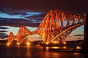 Forth Bridge Pillow Collection: Forth Rail Bridge over the River Forth illuminated at night, South Queensferry, Edinburgh