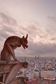 Religious Architecture Mouse Mat Collection: A gargoyle on Notre Dame de Paris cathedral looks over the city, Paris, France, Europe