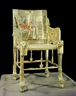 Pharaohs of Egypt Pillow Collection: The gilt throne, the back decorated with a scene showing the royal couple