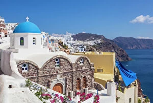Greece Mouse Mat Collection: Greek church of St. Nicholas with blue dome, Oia, Santorini (Thira), Cyclades Islands